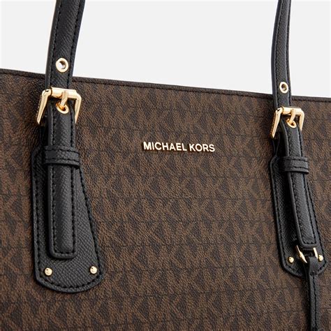 michael michael kors signature voyager multi-function top zip tote|Michael Kors zip top tote.